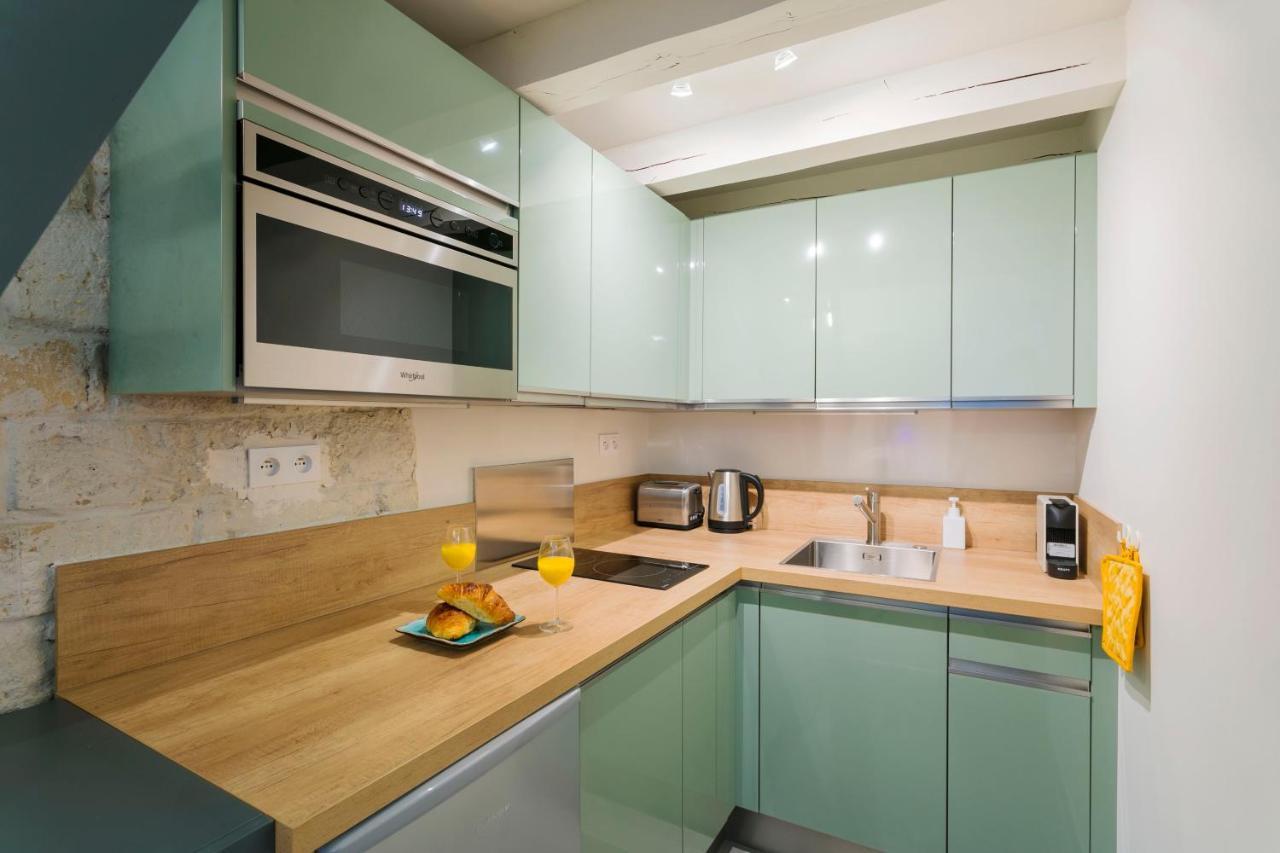La Madeleine Private Studio Apartment Paris Bagian luar foto