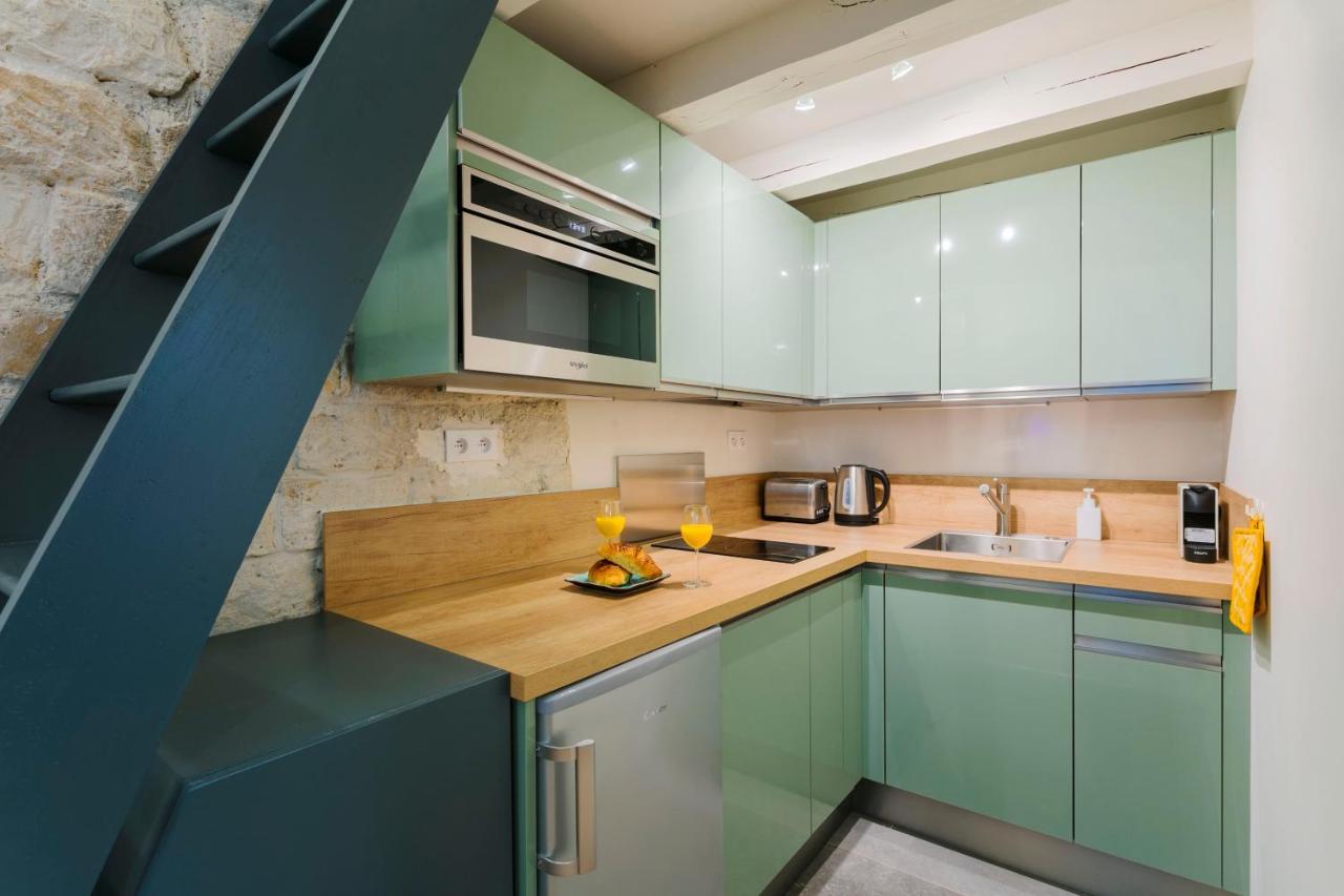 La Madeleine Private Studio Apartment Paris Bagian luar foto